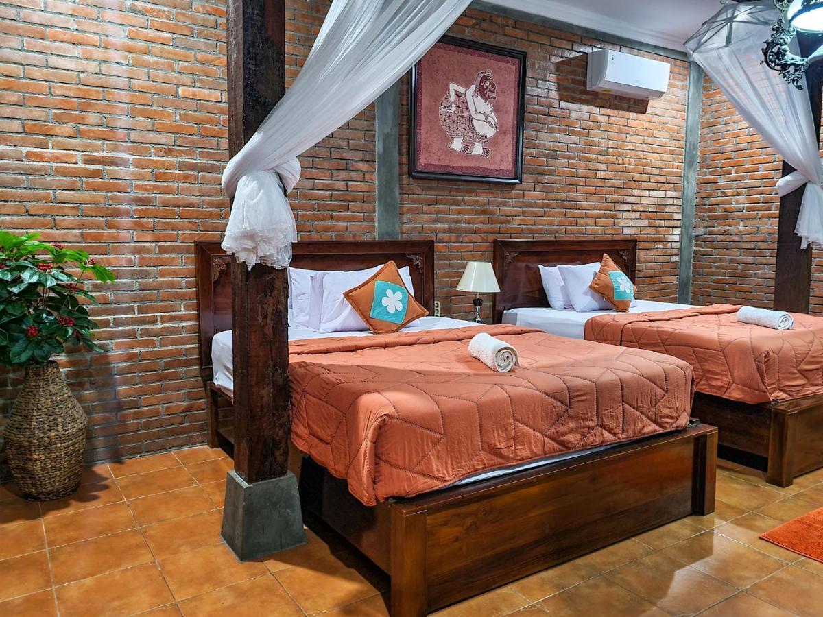 Ndalem Suryo Saptono Guest House Tugu Esterno foto
